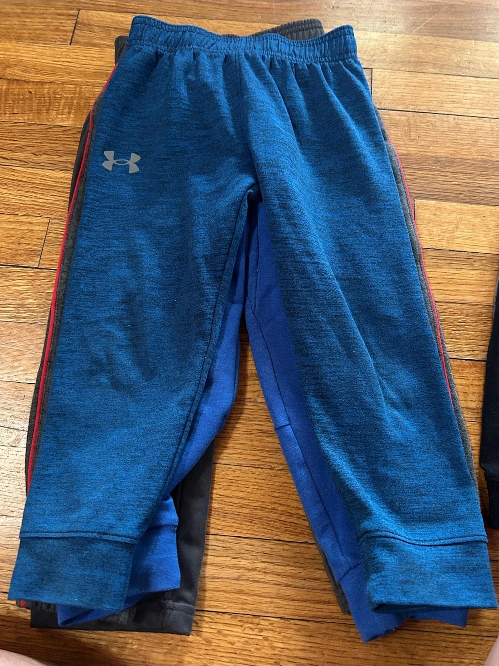 Under Armour Boys' Charcoal Gray Athletic Joggers with Orange Logo